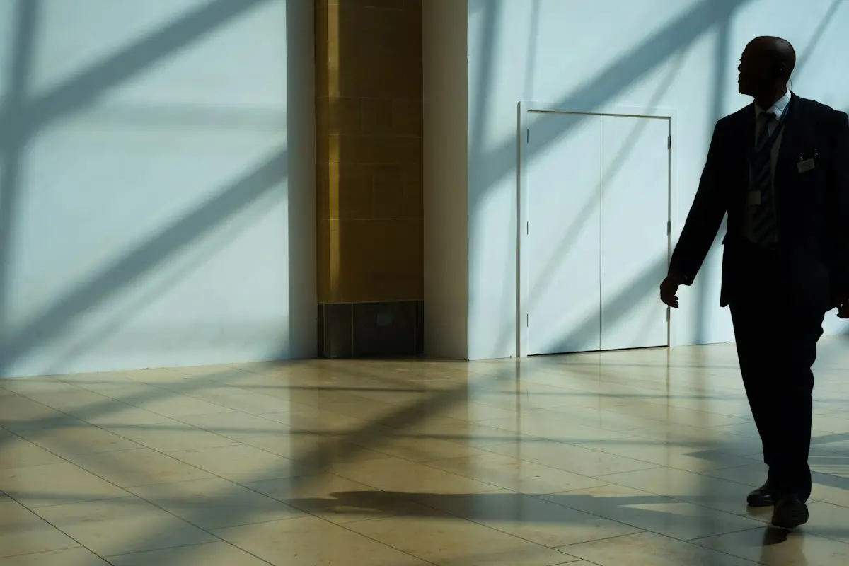Professional walking through a corporate corridor